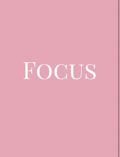 a pink book with the word focus written in white letters on it's cover