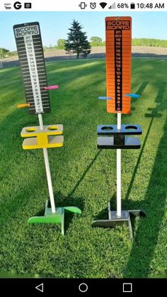 three different types of golf tees in the grass with numbers and arrows on them