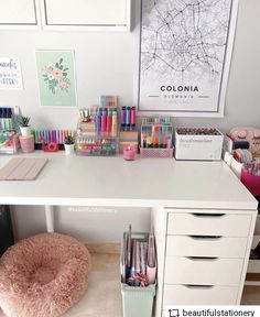 the desk is full of pens, pencils and other office supplies on top of it