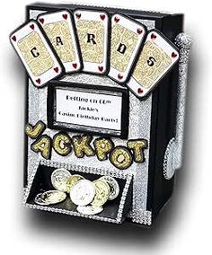 a card holder with cards in it and some coins on the bottom, sitting next to each other