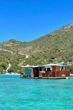 floating spa in the British Virgin Island with a mountain in the background and super clear water Bvi Catamaran Charter, Bvi Vacation, Amazing Resorts, Scrub Island, Catamaran Charter, Virgin Gorda, Sound Book, Tropical Destinations, British Virgin Islands