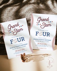 two baseball themed birthday cards sitting on top of a bed next to an envelope with the words grand slam