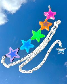 All of our Jewelry is handmade in house 💖 Star Child- go wild! Our Star Child chain is handmade with high quality materials and will last you many festival seasons. Made with vibrant rainbow acrylic that is sure to make you outfit pop. - Chain is adjustable - The chain is lightweight acrylic- "Cosmic Drip" charm at end of chain Rainbow Belt, Rainbow Belts, Rainbow Accessories, Star Child, House Star, Festival Belt, Rainbow Stars, Fairy Festival, Star Clothing