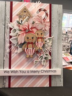 a handmade christmas card with two teddy bears on it and the words, we wish you a merry christmas