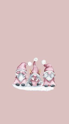 three little pink gnomes sitting on top of a snow covered ground with one wearing a santa hat