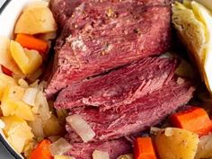 corned beef, potatoes and carrots in a slow cooker