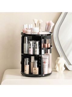 About this item LARGE CAPACITY - The HBlife 360 rotating organizers and storage can hold at least 30 makeup brushes, 20 skincare products, hair accessories, and other beauty and bathroom supplies. The 360-rotating designs allow you to grab what you need quickly. PERFECT DESIGN - HBlife adjustable cosmetic display case maximizes your storage needs. The trays can design at a height to fit various sizes of cosmetics and accessories. It will approve by your vanity and bathroom. DIY your charming spa Makeup Tools Photography, Makeup Caddy, Beauty Organizer, Makeup Tools Products, Perfume Organization, Acrylic Organizer Makeup, Make Up Tools, Beauty Organization, Cosmetic Display