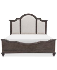 the headboard and foot board are made from wood, with white linen on top