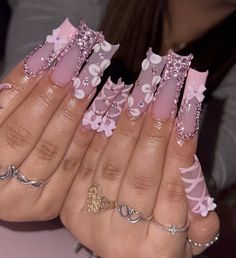 Long Pink Butterfly Nails, Blinged Out Pink Acrylic Nails, Blingy Pink Nails, Long Square Birthday Nails, Hot Pink Bling Nails Rhinestones, Xl Bling Acrylic Nails, Rhinestone Acrylic Nails Bling, Candy Land Nails Acrylic, Pink Long Nails With Gems