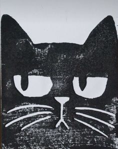 a black and white drawing of a cat's face