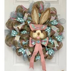 a wreath that has a bunny on it