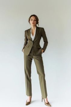 This sophisticated Sage Green Single Breasted Suit is crafted from high-quality fabric and premium imported materials. Each suit is expertly handcrafted by our skilled tailors, ensuring precise stitching, a well-structured lining, and durability that maintains its shape for years. With extra margins in the length, sleeves, and sides, this suit is easily alterable for a perfect fit, even if your size changes over time. Explore more color options and designs in our 'Single Breasted Suits' section. * This is a 2-piece set, consisting of a jacket and trousers.   * We offer full customization for a tailored fit. Just send us your measurements (Chest, Stomach, Waist, Hip, Shoulder, and Height) after placing your order.   * Interested in a different style or color? Reach out to us, and we'll work Sage Green Suits Women, Sage Suit Women, 3 Piece Suits For Women, Women Suits Business, Woman Wearing Suit, Suit For Women Formal, Court Outfits, Green Suit Women, Court Fits