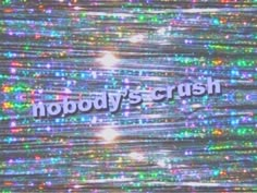 the words nobody's crush are displayed in front of an image of colorful lights