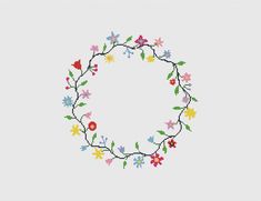 a cross stitch pattern with flowers and leaves in the shape of a circle on a white background