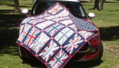 a car with a quilt on top of it