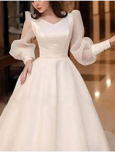 Hall Formal Wedding Dresses A-Line V Neck Long Sleeve Chapel Train Satin Bridal Gowns With Solid Color Cream Long Sleeve Gown With Fitted Bodice, Dress Muslim Modern, Formal Wedding Dresses, Dress Outfits Party, Neat Casual Outfits, Satin Bridal Gowns, Modest Evening Dress, Modest Wedding Gowns, Cute Dresses For Party