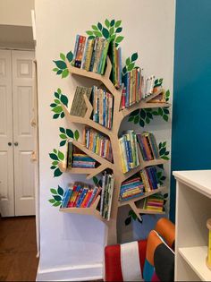 a tree shaped book shelf with books on it