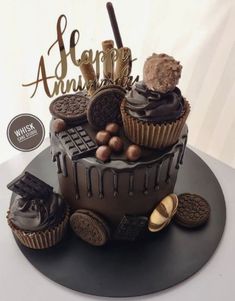 a chocolate cake with cookies and oreo cookies on top