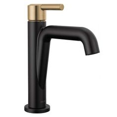 the black and gold faucet is on display in this image, it's very