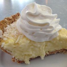 a piece of pie with whipped cream on top