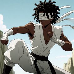 a man with dreadlocks is doing karate