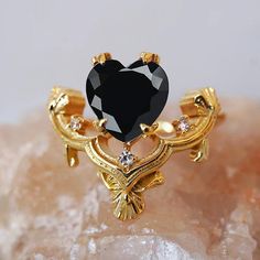 Heart of the Ocean Onyx Diamond Ring in 14K and 18K Gold – Tippy Taste Jewelry Gold Gothic Wedding Rings, Black Heart Cut Jewelry For Wedding, Elegant Gold Ring With Black Spinel, Elegant Gold Rings With Black Spinel, Gothic Gold Rings For Anniversary, Luxury Gold Heart Ring With Gemstone, Elegant Gold Heart Ring With Gemstone, Gold Gothic Jewelry For Anniversary, Elegant Black Heart Ring For Weddings