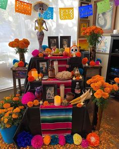 a table topped with lots of decorations and flowers