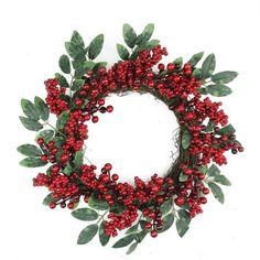 a wreath with red berries and green leaves