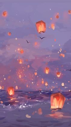 many lanterns floating in the air over water