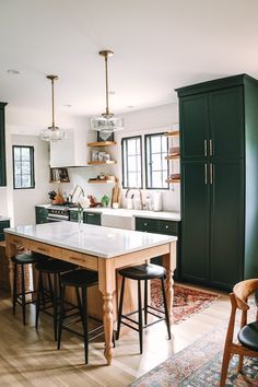 the kitchen is clean and ready to be used as a dining room or family room