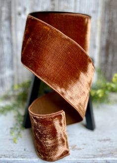 a brown velvet ribbon on top of a chair