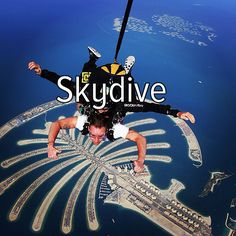 a man is skydiving over the ocean with an advertisement above him that reads skydive