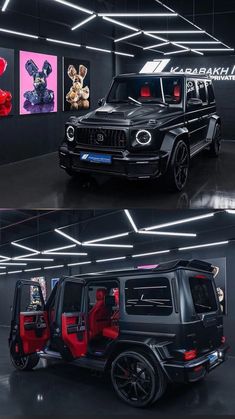 the black and red jeep is parked in a garage