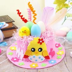 an easter cake decorated with eggs and chicks