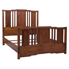 a wooden bed frame with no headboard and foot board