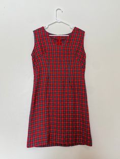 "This 1970s vintage shift dress has been handmade from a flannel-like material. It is in excellent condition!  Measurements (taken flat):    - Bust: 18\"    - Waist: 16\"    - Length: 35\""