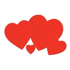 three red heart cutouts sitting next to each other on top of a white surface