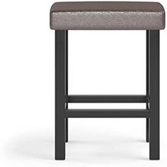 an upholstered bar stool with a brown seat