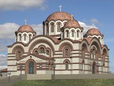 a large church with three domes on it's sides