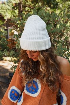 Get ready for the effortlessly cool and classic touch of the Maybelle Waffle Beanie—the perfect addition to your cool-weather wardrobe! Cozy waffle knit fabric Fitted beanie silhouette Fold over edge detail Perfect essential boho finish! Pair with: Eye Of The Sun Padded Bralette, Ethereal Shine Stacked Bracelet and Dreamscape Layered Necklace. *Due to lighting and differences in monitors, actual colors may vary slightly from what appears online. Model is 5'4" and wearing a size OS. Approximate m Cozy Waffle Knit Winter Sweatshirt, Waffle Stitch Hat/beanie Pattern, Playful White Adjustable Beanie, Playful White Beanie One Size, Playful Warm White Beanie, Boho Essentials, Bralette Outfit, Padded Bralette, Layered Necklace