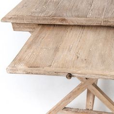 an old wooden table with two planks on the top and one at the bottom