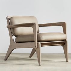 the chair is made out of wood and leather