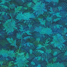 a blue and green wallpaper with flowers on it