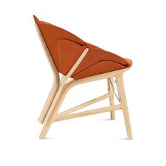 a wooden chair with an orange leather seat and backrest, viewed from the side