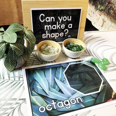 a table topped with bowls of food next to a sign that says can you make a shape?