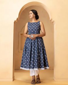 This is a beautiful 3-piece anarkali suit set. The set includes anarkali kurta with 32 kali has round neck, sleeveless & calf length teamed with solid cotton pants with elasticated waistband and a cotton printed dupatta with lace detailing. 3-piece set Suit Fabric-Cotton Dupatta Fabric-Cotton Length-Calf Length Color - Blue Neck-Round Neck Work - Print Detailing Sleeves- Sleeveless Washing Care-Dry Clean or Quick Deep Wash DISCLAIMER - The color of the product may be differ due to screen setting Printed Anarkali Suits, Cotton Anarkali Suits, Printed Anarkali, Cotton Anarkali, Printed Dupatta, Anarkali Kurta, How To Hem Pants, Anarkali Suit, Kurta With Pants