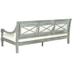 a gray wooden bench with white cushions