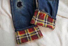 Vintage '40s/'50s plaid flannel lined patched jeans. Dark indigo cotton denim with plaid flannel lining.  High waist with metal zipper fly. Straight legs, slightly tapered, with shorter inseam. Best fit + fade with hand-stitched patches on knees.  Rare piece. DETAILS-----> Era: '40s/'50s Fabric: 100% cotton denim MEASUREMENTS-----> Tag: n/a - no size marked - should fit a modern size xs/s Waist: 13"  Rise:  11" Hips:  17.5" Thigh (3" from crotch seam):  10" Inseam:  28' Total Length:  37.5" Leg Knee Patches For Jeans, Flannel Patched Jeans, Vintage Blue Jeans With Patch Pockets, Fitted Vintage Jeans With Patches, Mid-rise Jeans With Patch Pockets In Recycled Denim, 50s Fabric, Jeans With Patches, Flannel Lined Jeans, Indigo Jeans