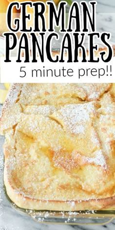 a pancake covered in powdered sugar with the words five minute prep german pancakes