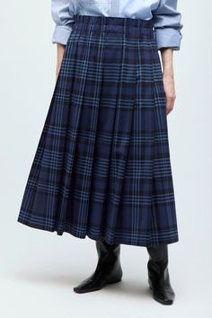 Made of deadstock woolens, our Rohanna skirt is an all-purpose classic made for that working girl at heart with a taste for timeless fashion. While our dark blue plaid conjures mysterious Nordic waters and remote fishing villages whose names we can’t pronounce, you can wear this to work, a dinner party, or on a long October weekend in the countryside.Made of deadstock woolens, our Rohanna skirt is an all-purpose classic made for that working girl at heart with a taste for timeless fashion. While Long Tartan Skirt, Scottish Skirt, Dark Blue Plaid, Long Plaid Skirt, Summer Dining, Tartan Skirt, Blue Party, Party Skirt, Fishing Villages